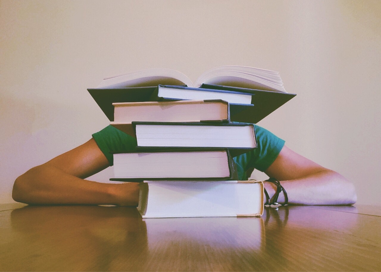 student with books